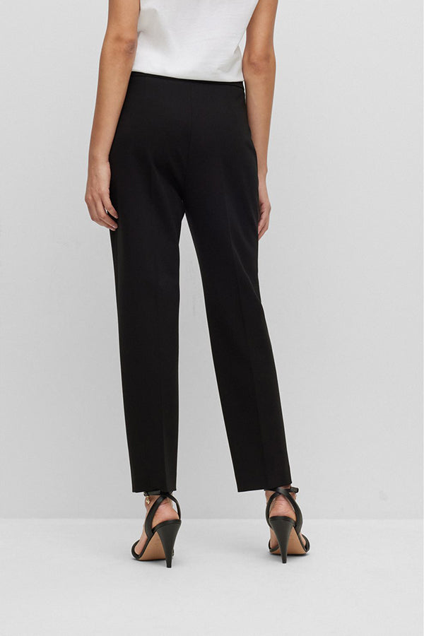 
                      
                        Black Hugo Boss pants
                      
                    