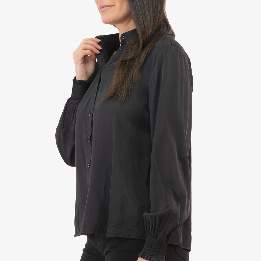 
                      
                        Nola Cream blouse in Black color
                      
                    