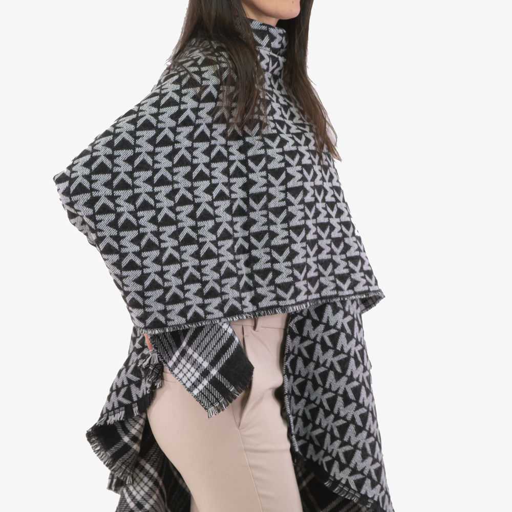 
                      
                        Michael Kors reversible cape in Black color
                      
                    