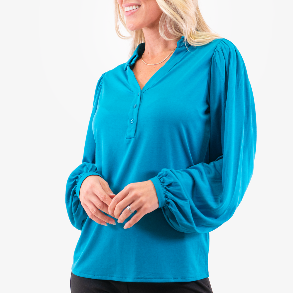 
                      
                        Esqualo Graphic Tunic in Teal color
                      
                    