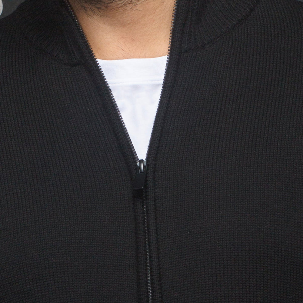 
                      
                        Au Noir merino sweater in black color
                      
                    