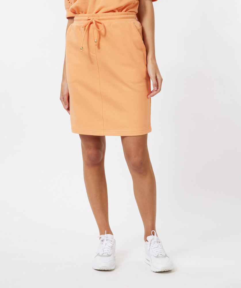 
                      
                        Esqualo skirt in Peach color
                      
                    