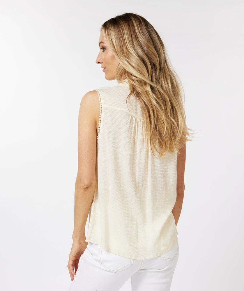 
                      
                        Esqualo Sleeveless Blouse in Off White color
                      
                    