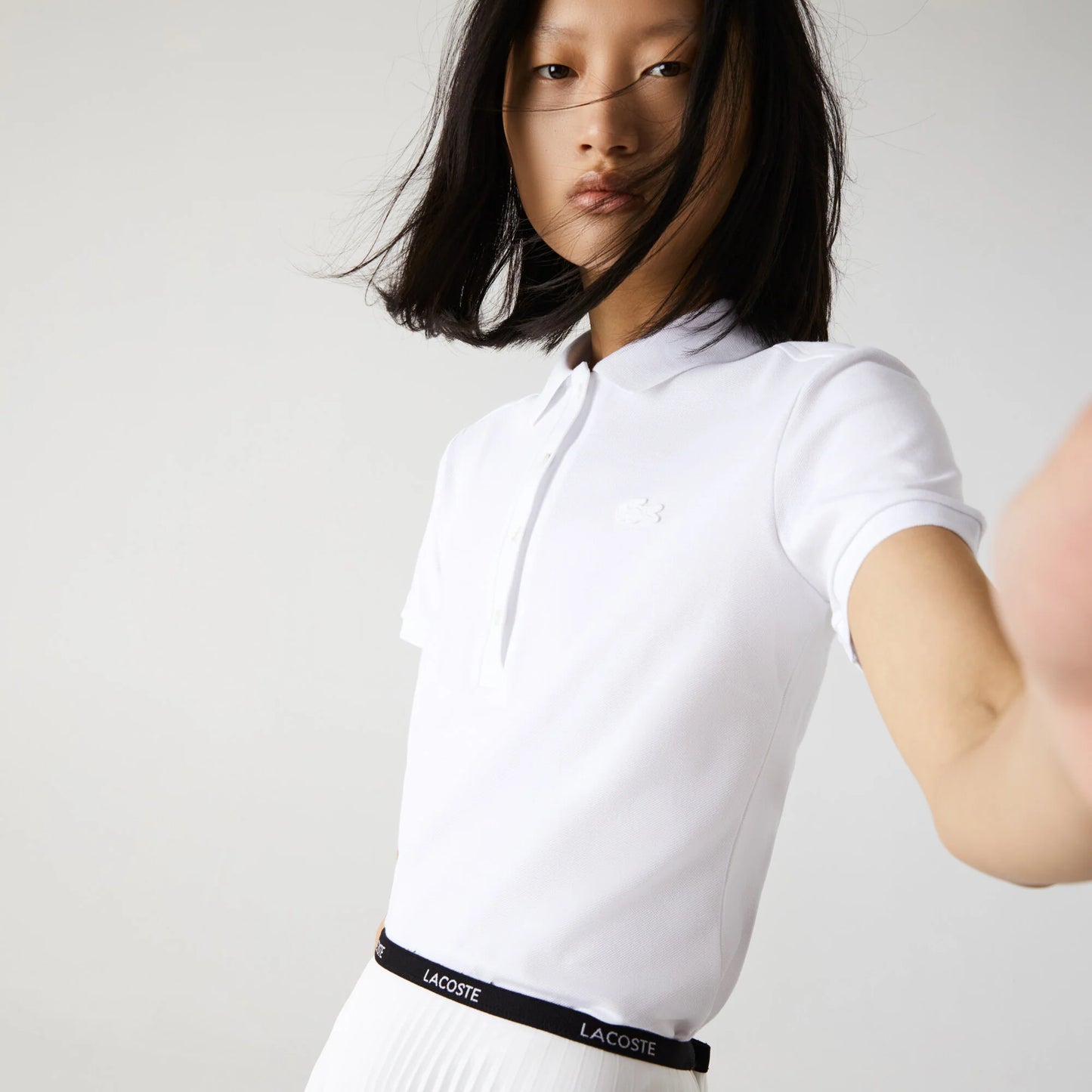 Polo Lacoste de couleur Blanc