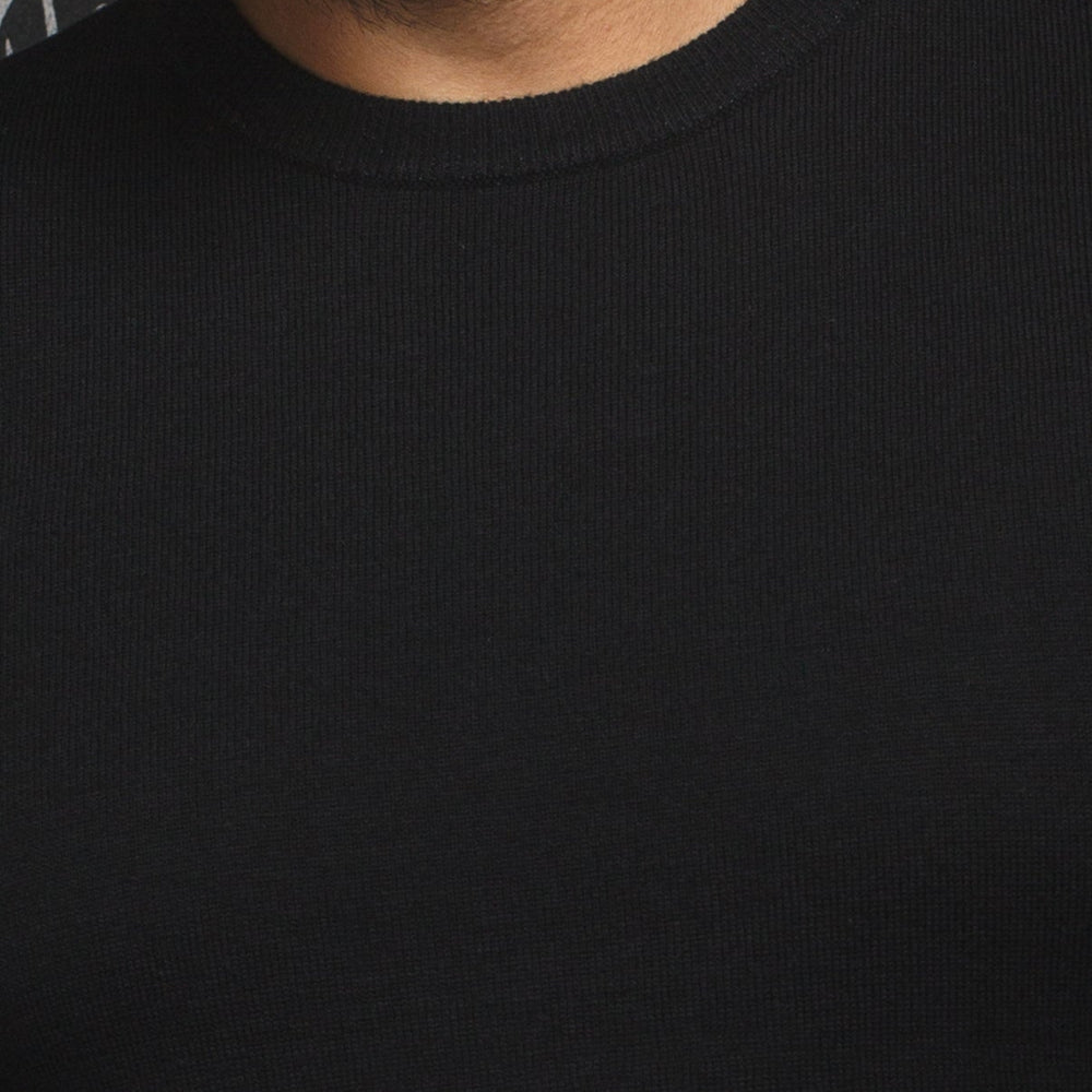 
                      
                        Au Noir merino sweater in black color
                      
                    