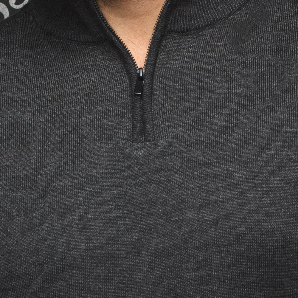 
                      
                        Au Noir merino sweater in charcoal color
                      
                    