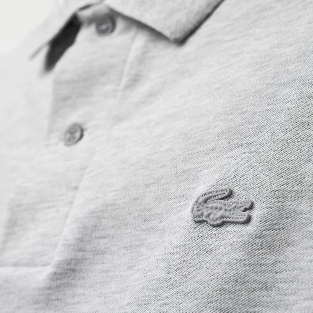 
                      
                        Polo Lacoste de couleur Gris
                      
                    