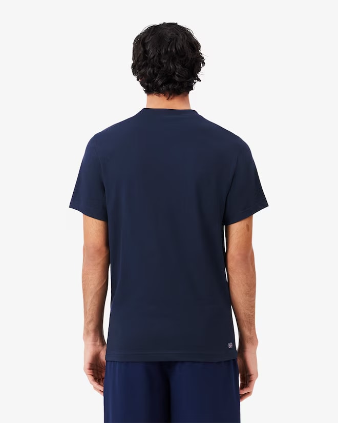 
                      
                        T-Shirt Lacoste de couleur Marine
                      
                    