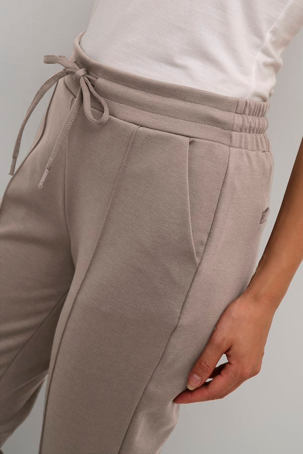 
                      
                        Taupe colored Culture pants
                      
                    