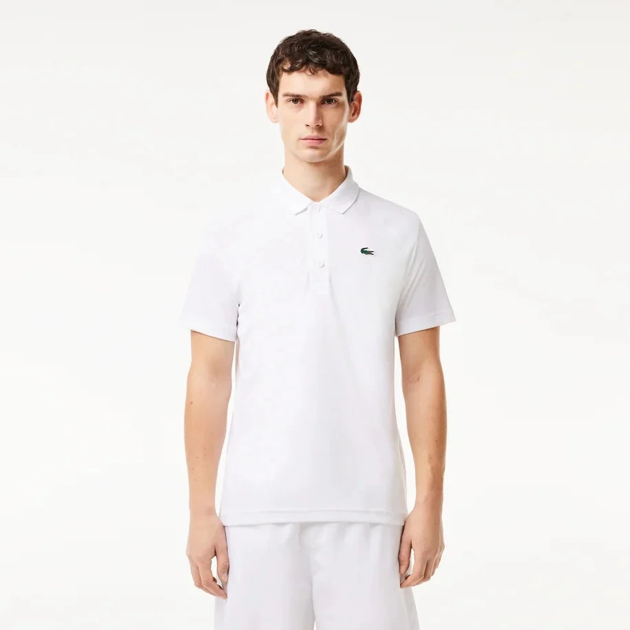 Polo Lacoste de couleur Blanc