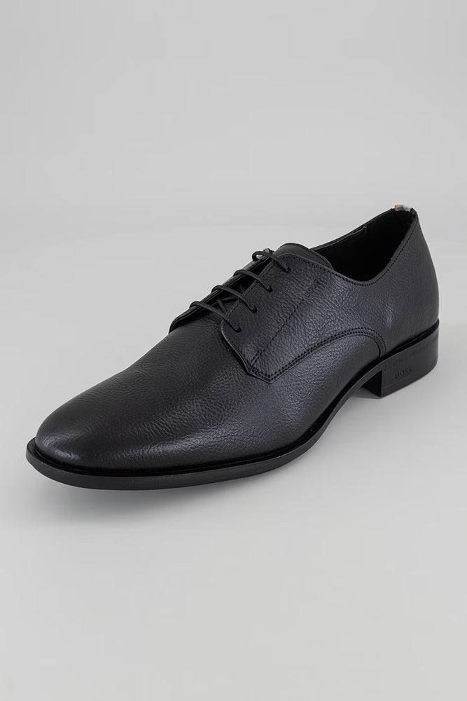 
                      
                        Soulier Hugo Boss de couleur Noir
                      
                    