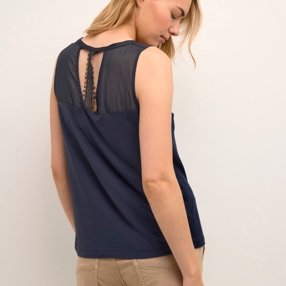 
                      
                        Navy colored Cream camisole
                      
                    